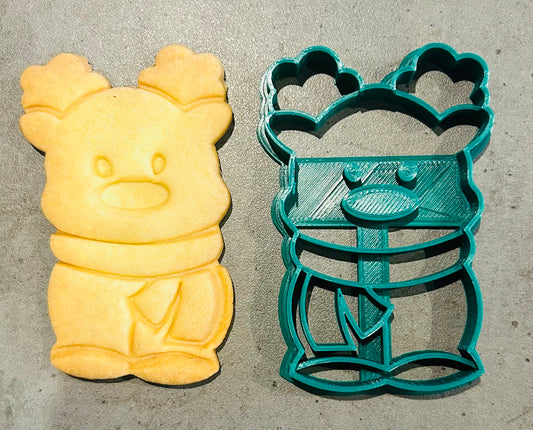 petit renne avec écharpe de Noël